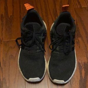 Women’s black adidas NMD sneakers